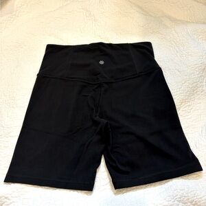 Athleta Elation ultra high rise 7” short. Black. Medium